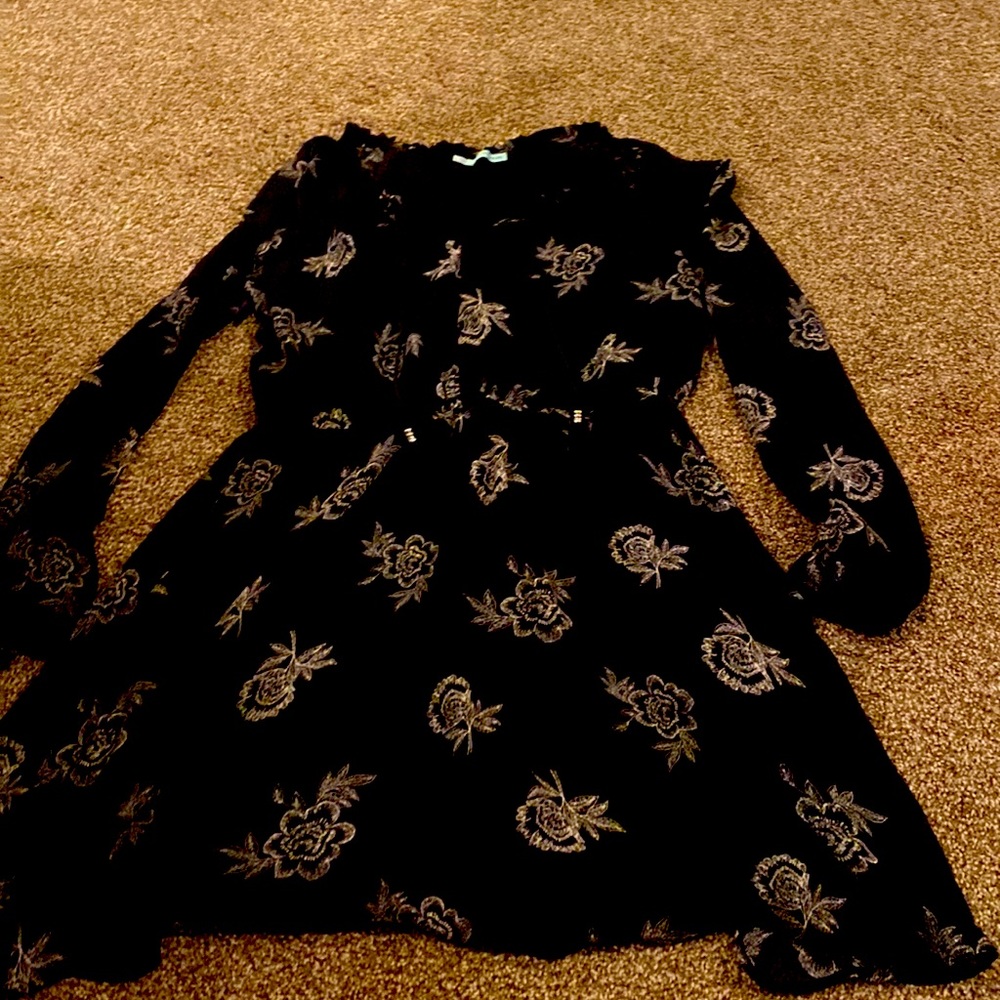 Black dress with white flowers.